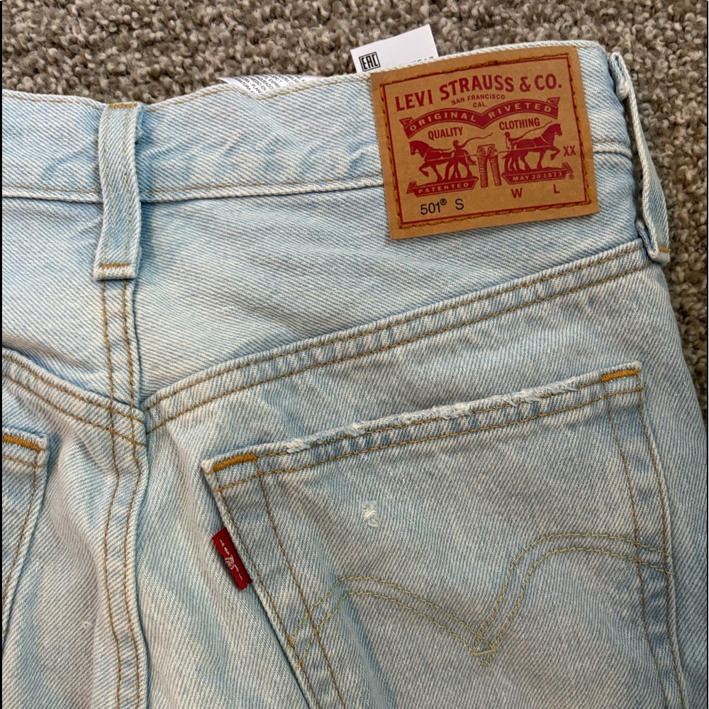 Levi’s 501 jeans, light wash